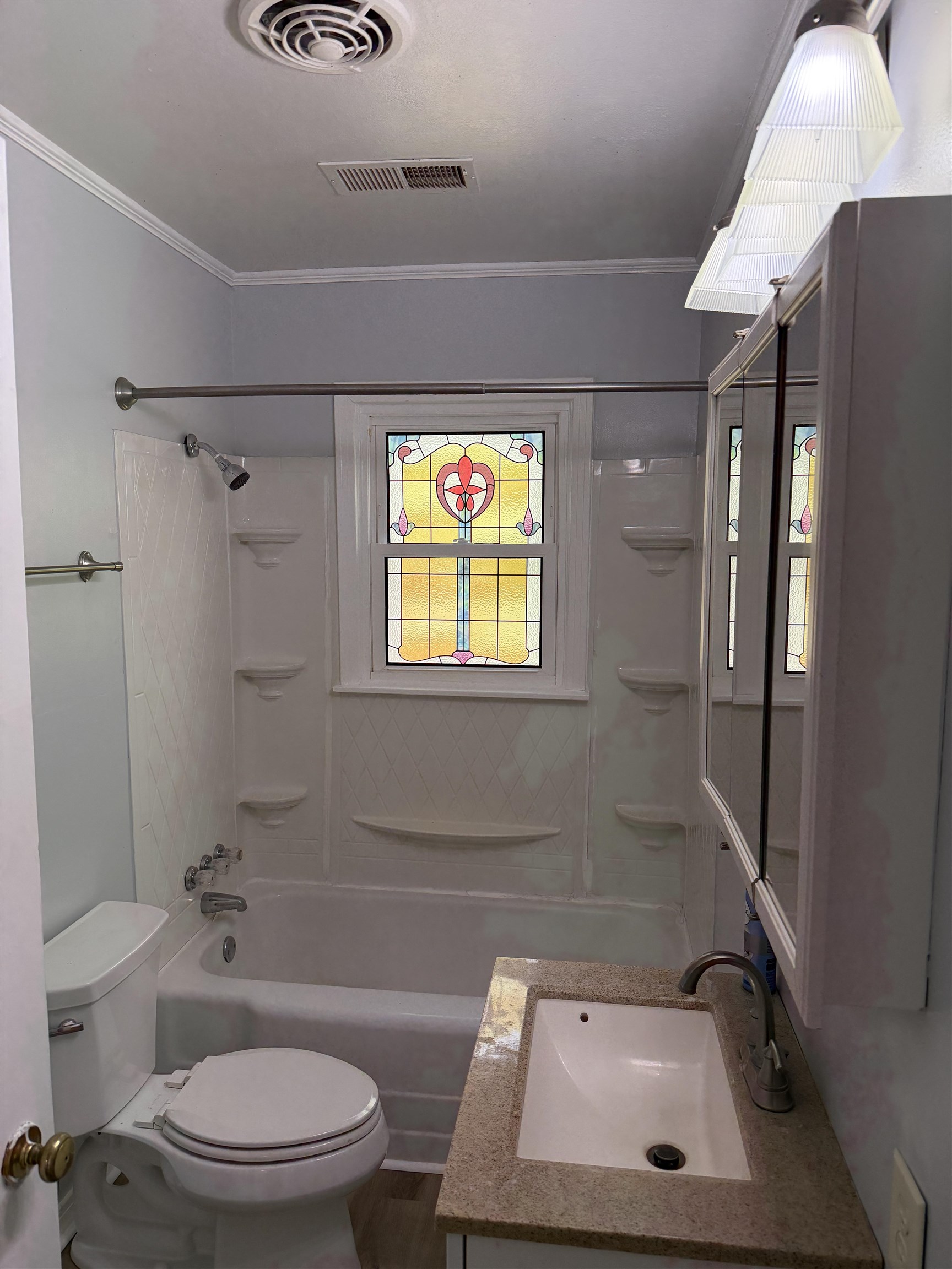 940 Old Lula Road Reagan, TN 38368 - Photo 19 of 39 a bathroom with a sink a toilet and shower