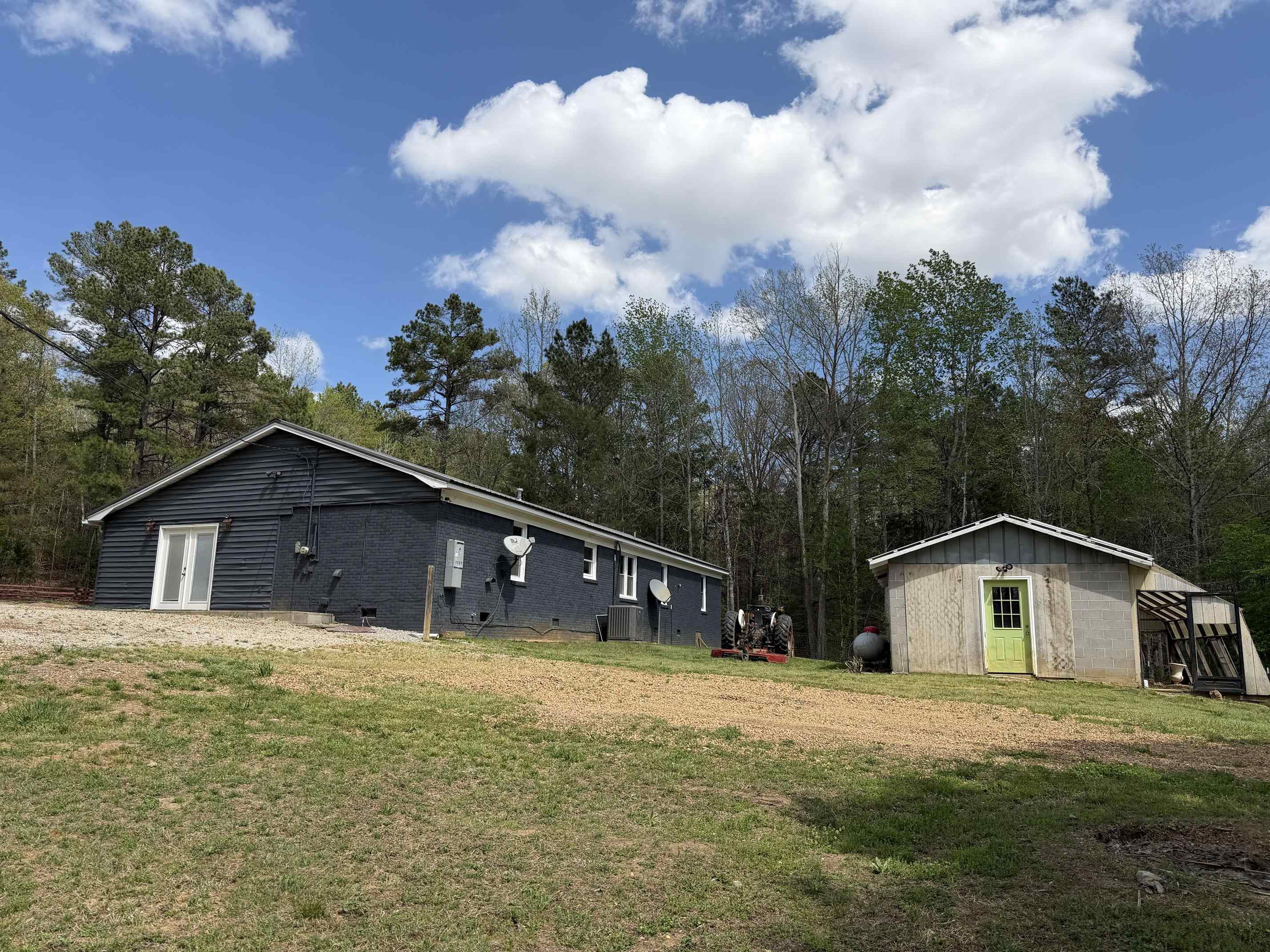 940 Old Lula Road Reagan, TN 38368 - Photo 24 of 39 a house with trees in the background