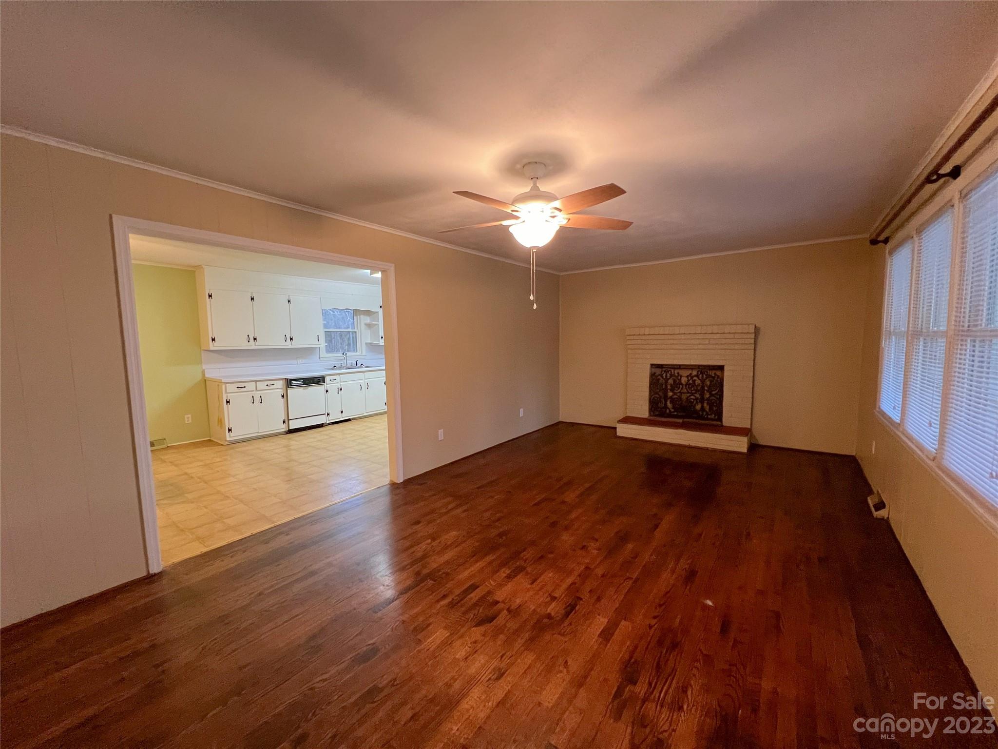 1265 Saluda Road Chester, SC 29706 - Photo 5 of 18 a view of empty room with wooden floor and fan