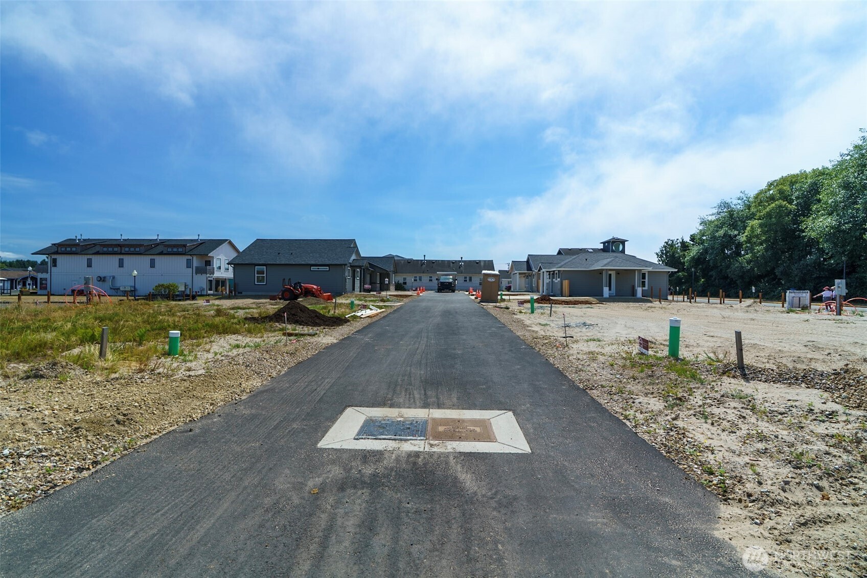 123 7th Street Southwest Long Beach, WA 98631 - Photo 3 of 15 a view of a swimming pool with a lounge chair