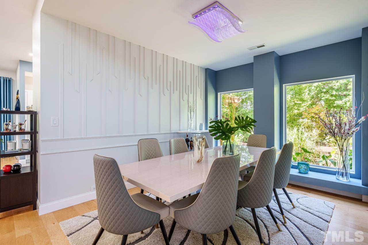 1028 Todd Road Knightdale, NC 27545 - Photo 17 of 48 a view of a dining room with furniture window and outside view