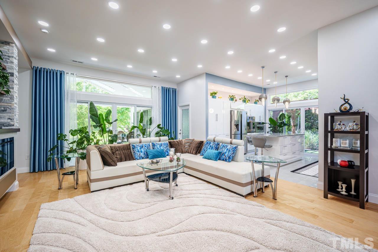 1028 Todd Road Knightdale, NC 27545 - Photo 22 of 48 a living room with furniture and a potted plant