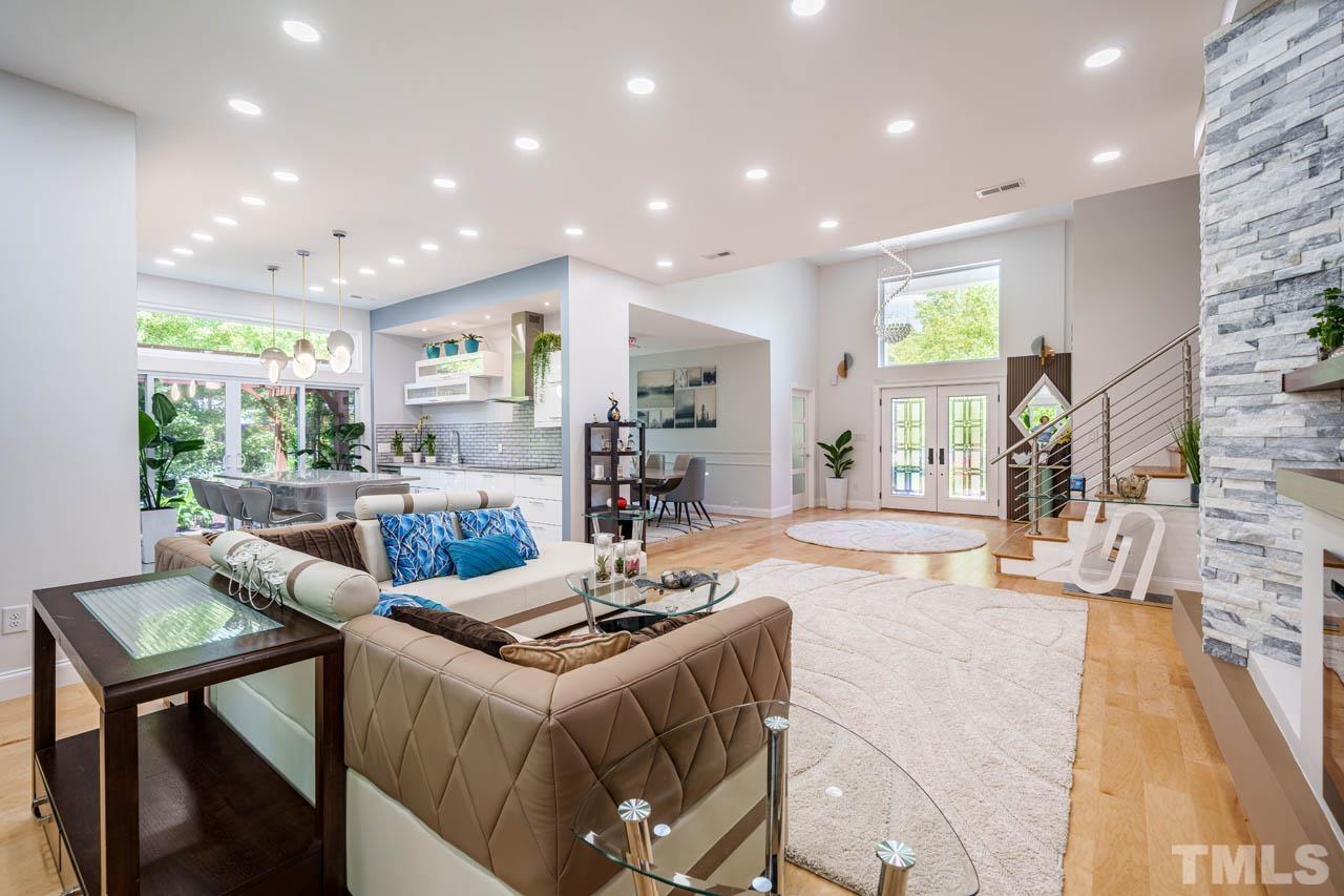 1028 Todd Road Knightdale, NC 27545 - Photo 23 of 48 a living room with fireplace furniture and a large window