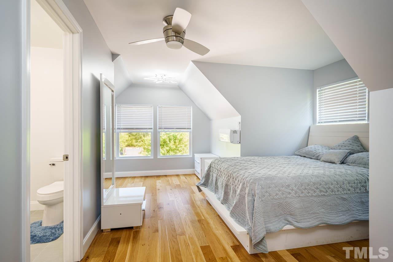 1028 Todd Road Knightdale, NC 27545 - Photo 34 of 48 a bedroom with a bed and a window