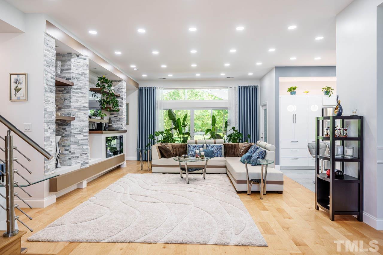 1028 Todd Road Knightdale, NC 27545 - Photo 38 of 48 a living room with furniture and a large window