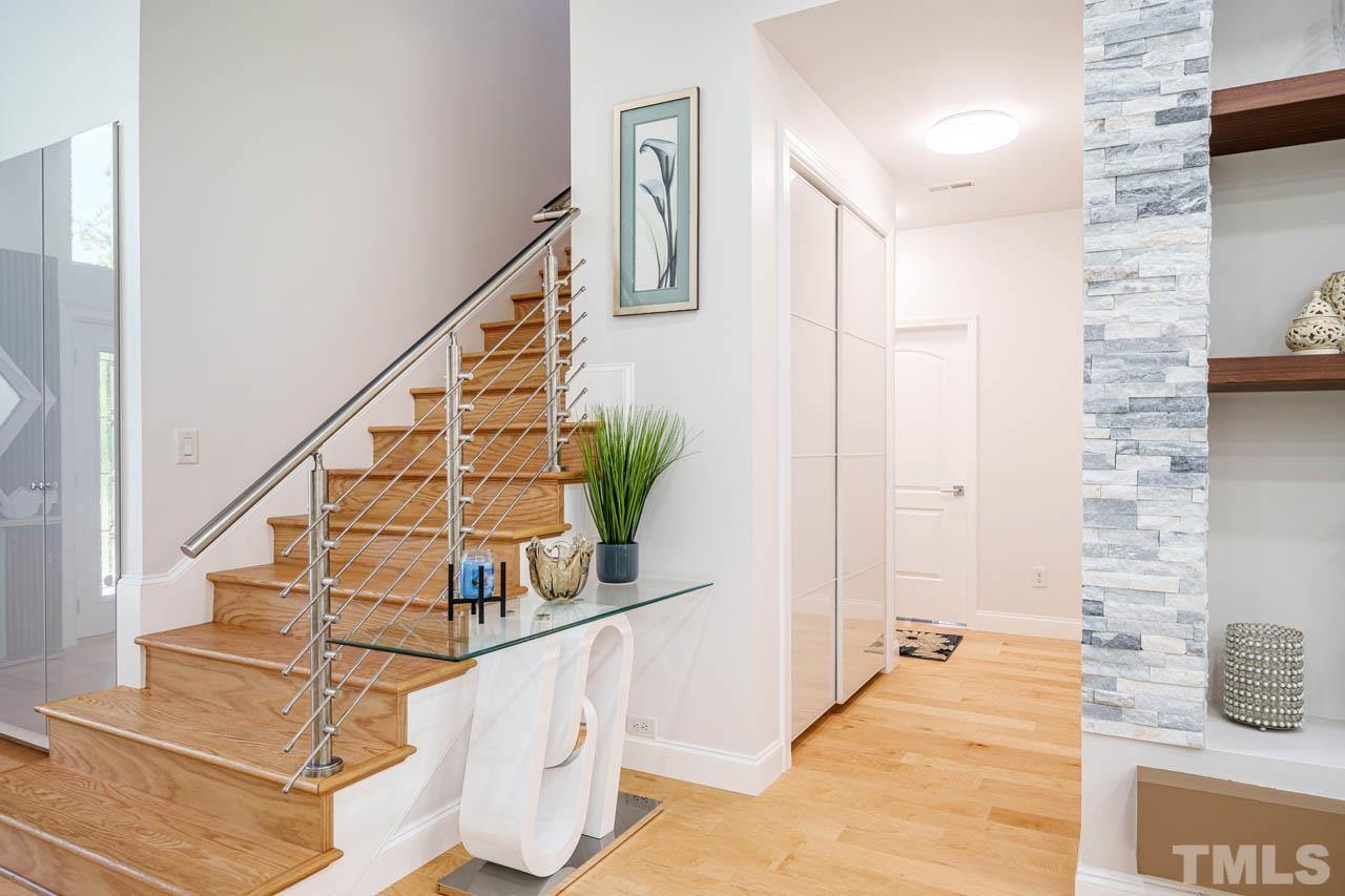 1028 Todd Road Knightdale, NC 27545 - Photo 40 of 48 a view of entryway and hall with wooden floor