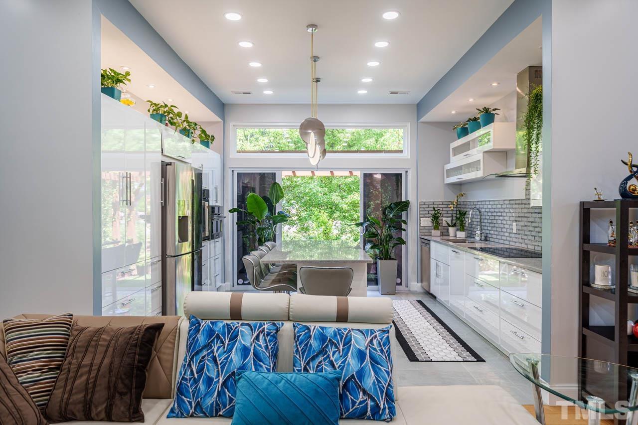 1028 Todd Road Knightdale, NC 27545 - Photo 41 of 48 a large living room with a large window