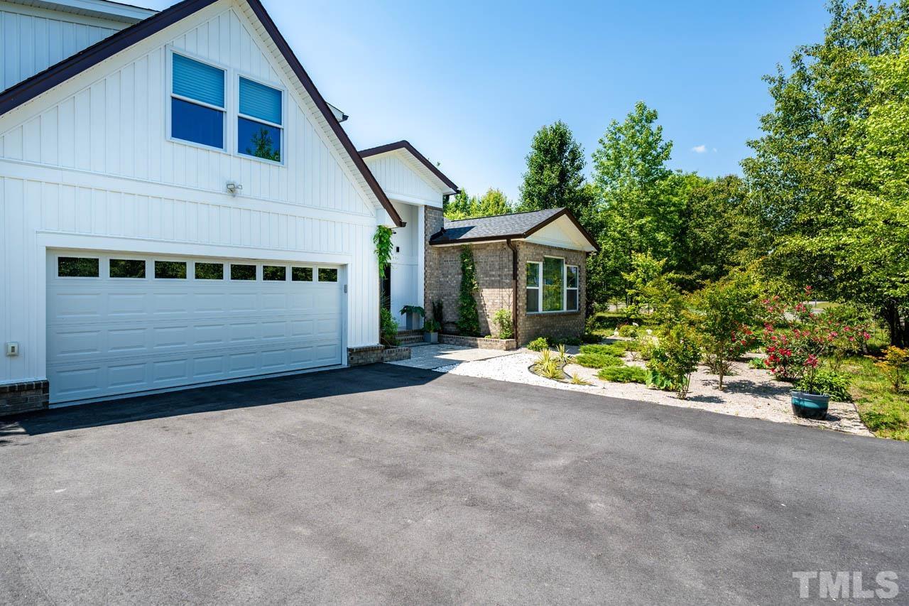 1028 Todd Road Knightdale, NC 27545 - Photo 47 of 48 a view of a house with a street