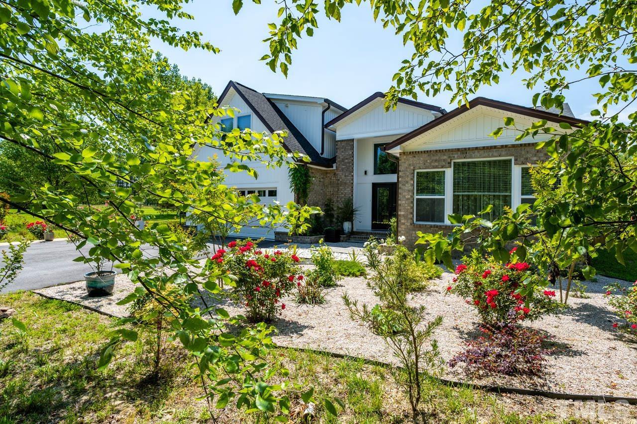 1028 Todd Road Knightdale, NC 27545 - Photo 5 of 48 front view of a house with a yard