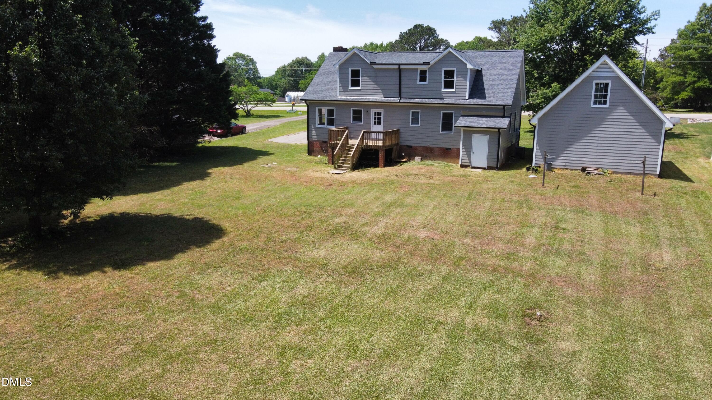 10917 Fanny Brown Road Raleigh, NC 27603 - Photo 53 of 54 an aerial view of a house with yard porch and furniture
