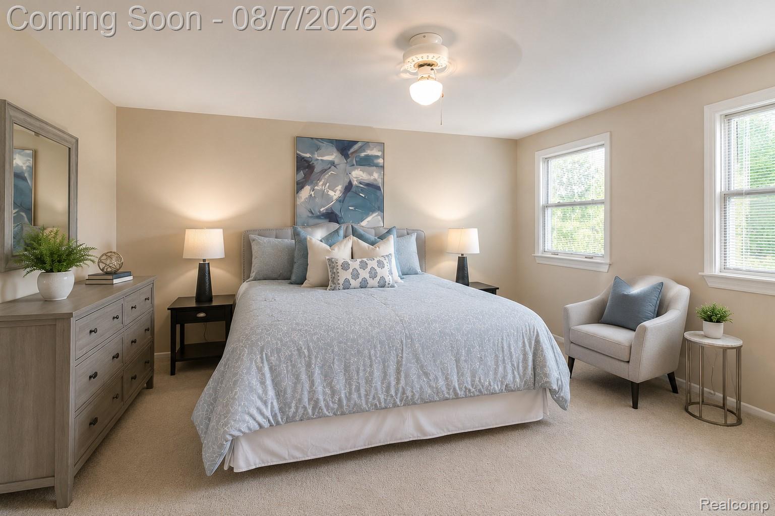 3149 Tamarron Drive Rochester, MI 48309 - Photo 25 of 48 Spacious bedroom featuring neutral wall tones, soft carpeting, two windows, and a ceiling fan with integrated lighting