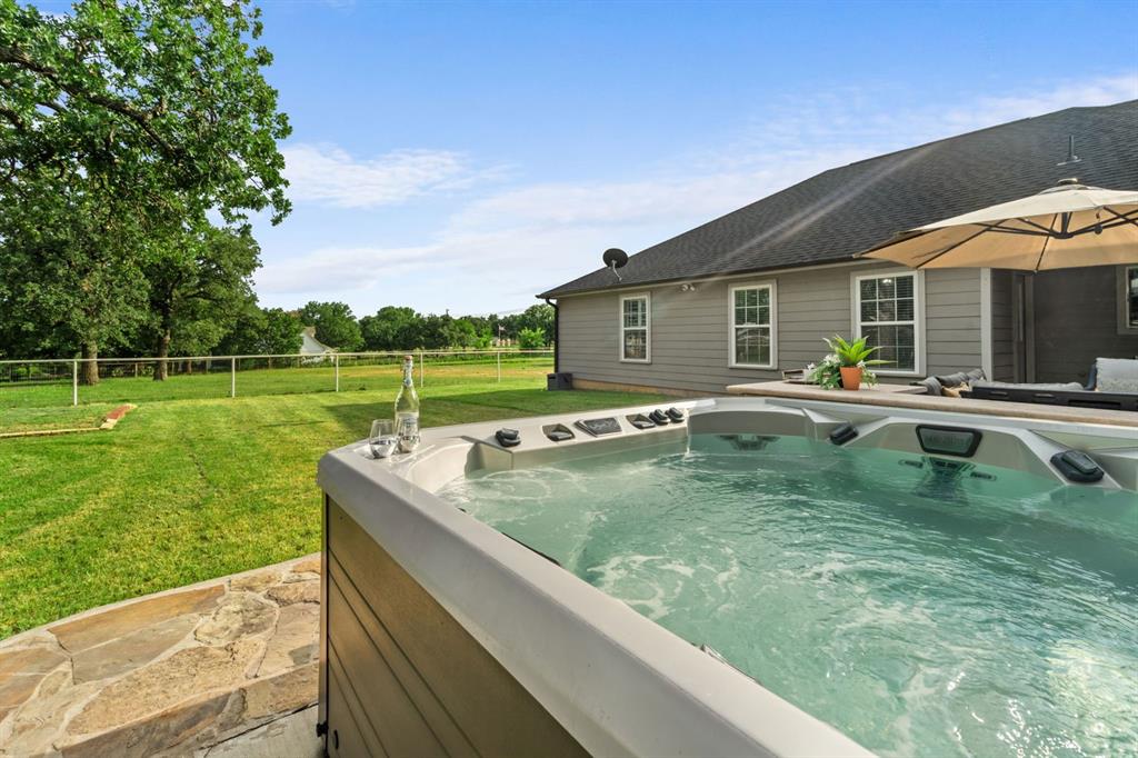 175 Porter Road Bartonville, TX 76226 - Photo 6 of 40 a view of a house with a backyard