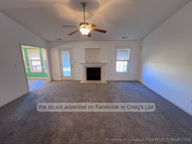 2249 Chasewater Road Fayetteville, NC 28306 - Photo 2 of 13 a view of an empty room with window and fireplace