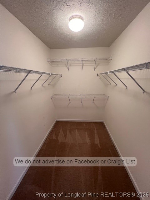 2249 Chasewater Road Fayetteville, NC 28306 - Photo 6 of 13 a view of a room with racks on the wall