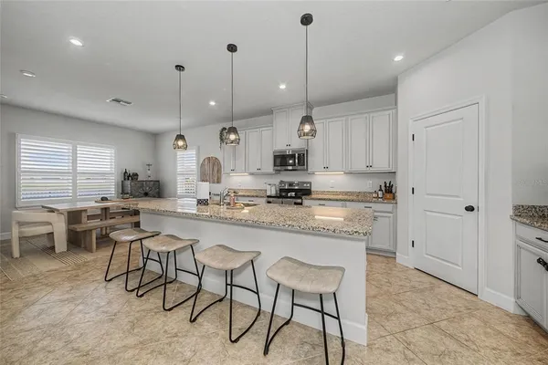 a bedroom with furniture and window