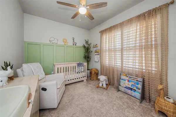 a view of a swimming pool and lounge chair