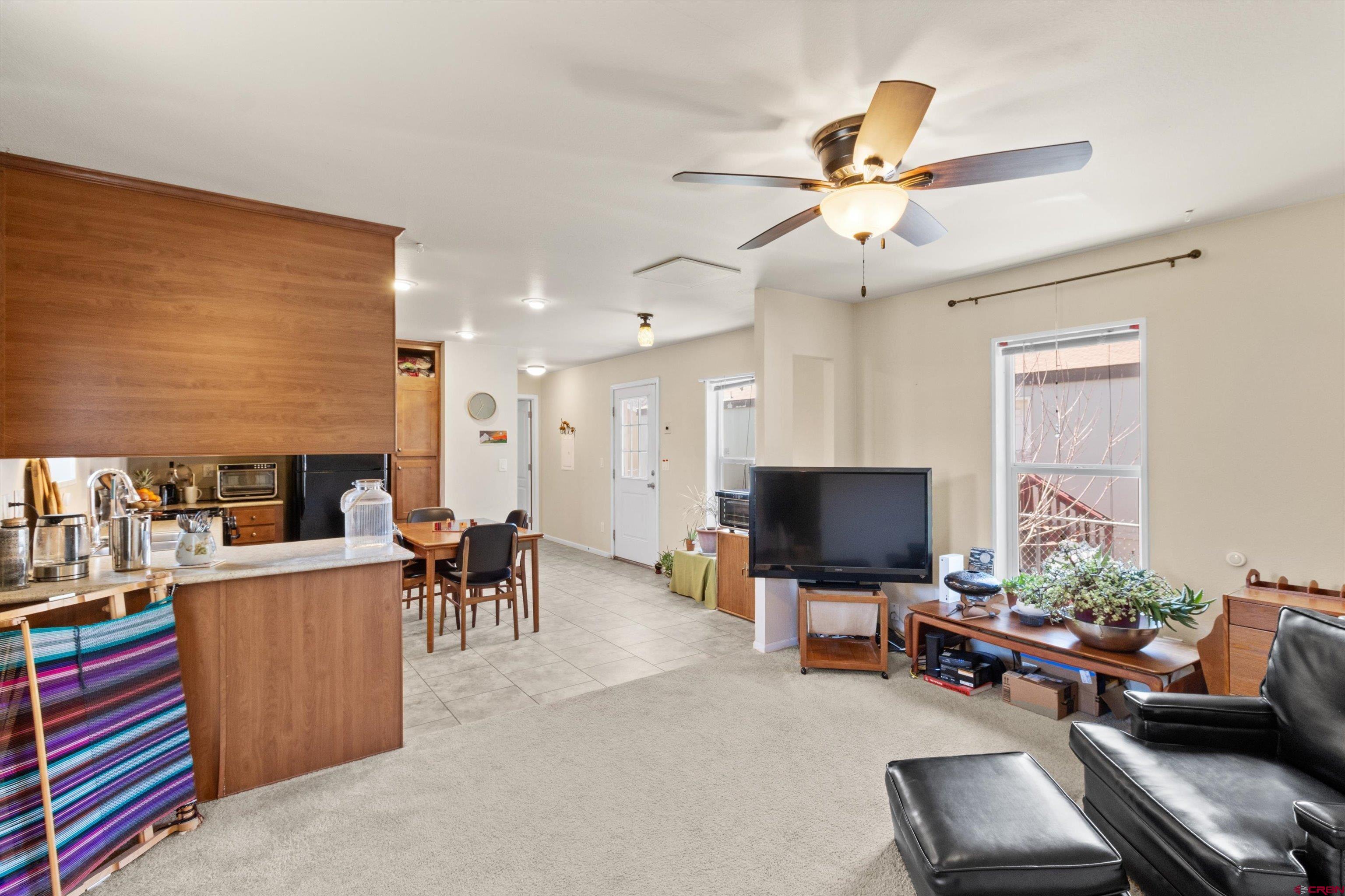 6000 County Road 203, Unit 34 Durango, CO 81301 - Photo 13 of 33 a living room with furniture and a flat screen tv