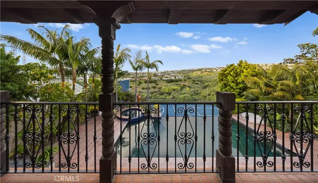 a front view of a house with swimming pool