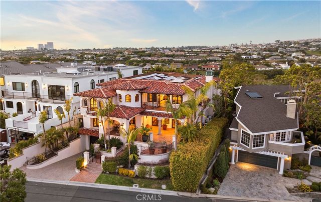 a view of houses with an outdoor space and lakeside