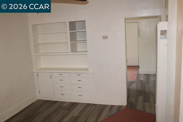 a view of an empty walk in closet