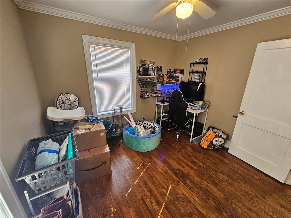 237 Pine Lane Anderson, SC 29621 - Photo 21 of 22 This cozy bedroom features warm wood flooring and a refreshing ceiling fan.