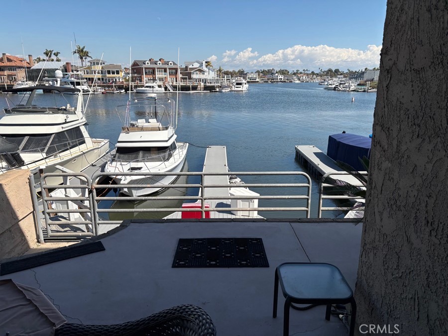 a view of a chairs and table in a terrace