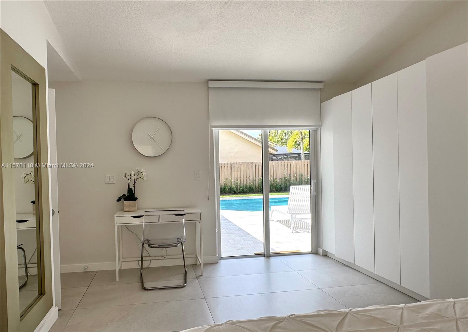 1945 Lakeshore Drive Weston, FL 33326 - Photo 12 of 19 a view of room with window and outdoor seating
