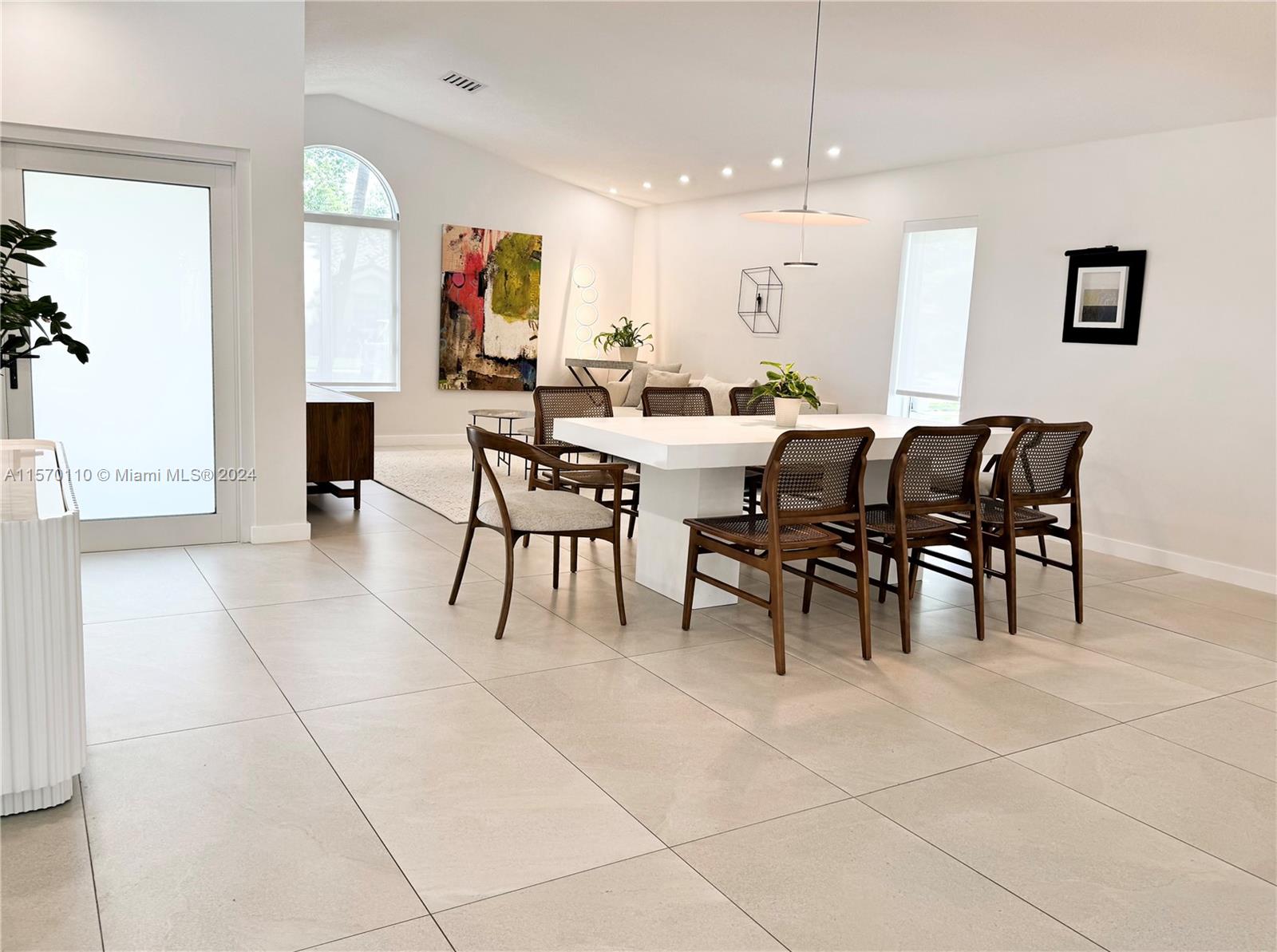 1945 Lakeshore Drive Weston, FL 33326 - Photo 2 of 19 a view of a dining room with furniture