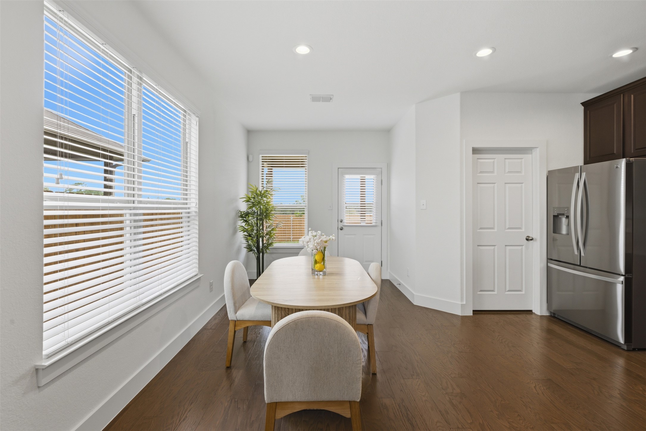 2004 Garretts Way Manchaca, TX 78652 - Photo 14 of 37 This dining area features hardwood floors and recessed lighting, offering a bright and inviting space