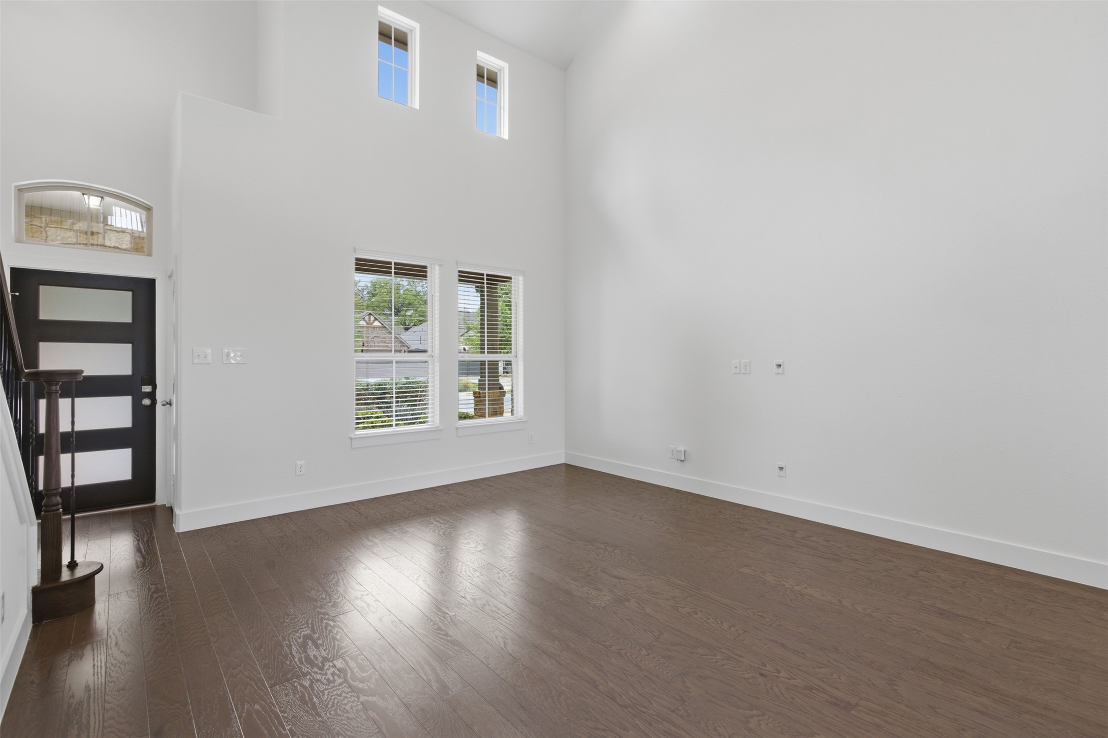 2004 Garretts Way Manchaca, TX 78652 - Photo 6 of 24 Entrance foyer with dark wood-type flooring and a high ceiling