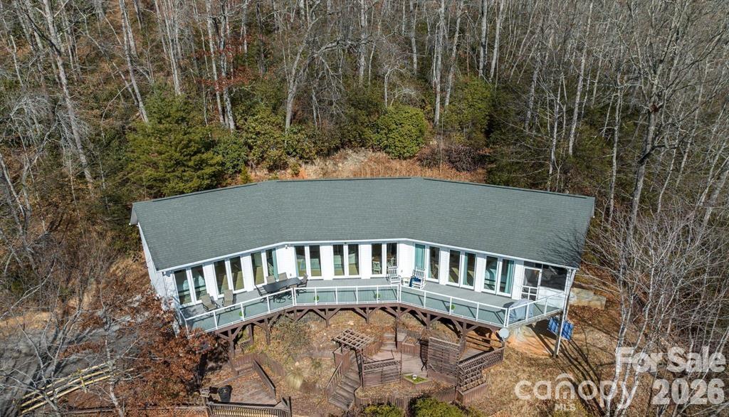 56 Great Horned Owl Road Candler, NC 28715 - Photo 31 of 32 a front view of a house with a yard