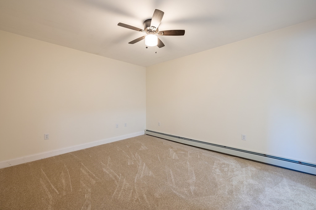 15 Rose Street, Unit 2 Haverhill, MA 01830 - Photo 7 of 15 an empty room