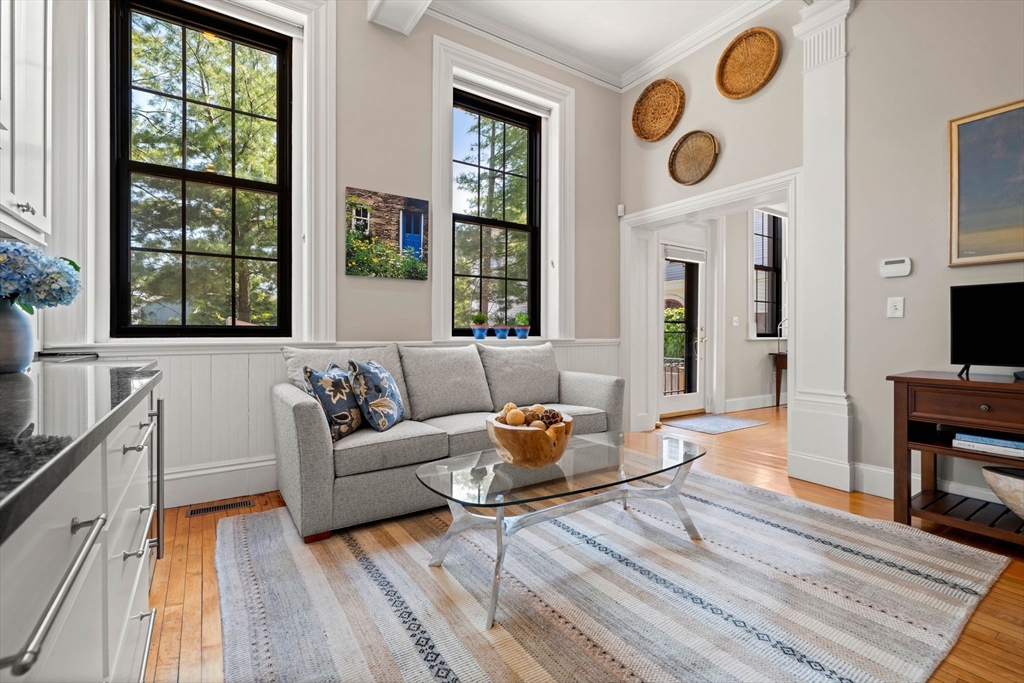 44 Pleasant Street, Unit 1 Marblehead, MA 01945 - Photo 5 of 35 a living room with furniture and large window