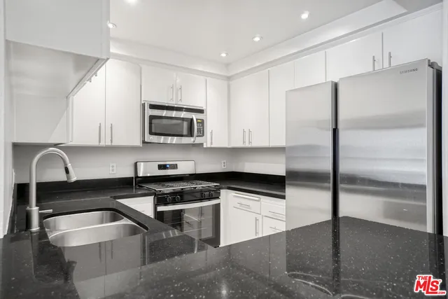 a room with wooden floor and window