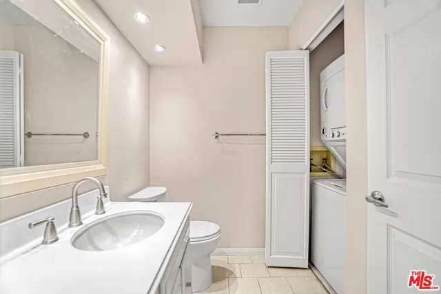 a view of a brick house with a yard