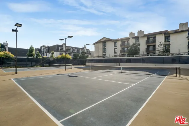 a view of a swimming pool with a terrace