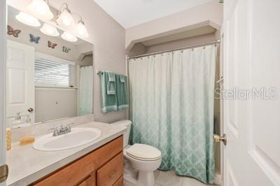 12351 Southwest 73rd Street Ocala, FL 34481 - Photo 28 of 77 a bathroom with a sink toilet and shower