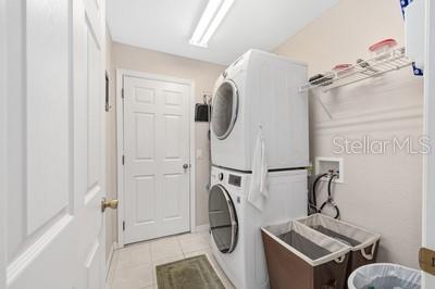 12351 Southwest 73rd Street Ocala, FL 34481 - Photo 36 of 77 a utility room with dryer and washer
