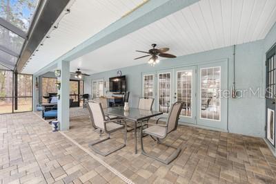 12351 Southwest 73rd Street Ocala, FL 34481 - Photo 40 of 77 a view of a livingroom with furniture and a ceiling fan
