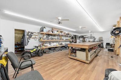 12351 Southwest 73rd Street Ocala, FL 34481 - Photo 59 of 77 a living room with fireplace furniture and a window