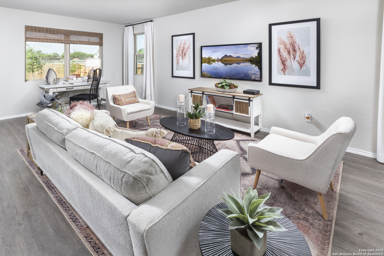 4907 Blue Ranch San Antonio, TX 78222 - Photo 5 of 18 a living room with furniture a large window with wooden floor
