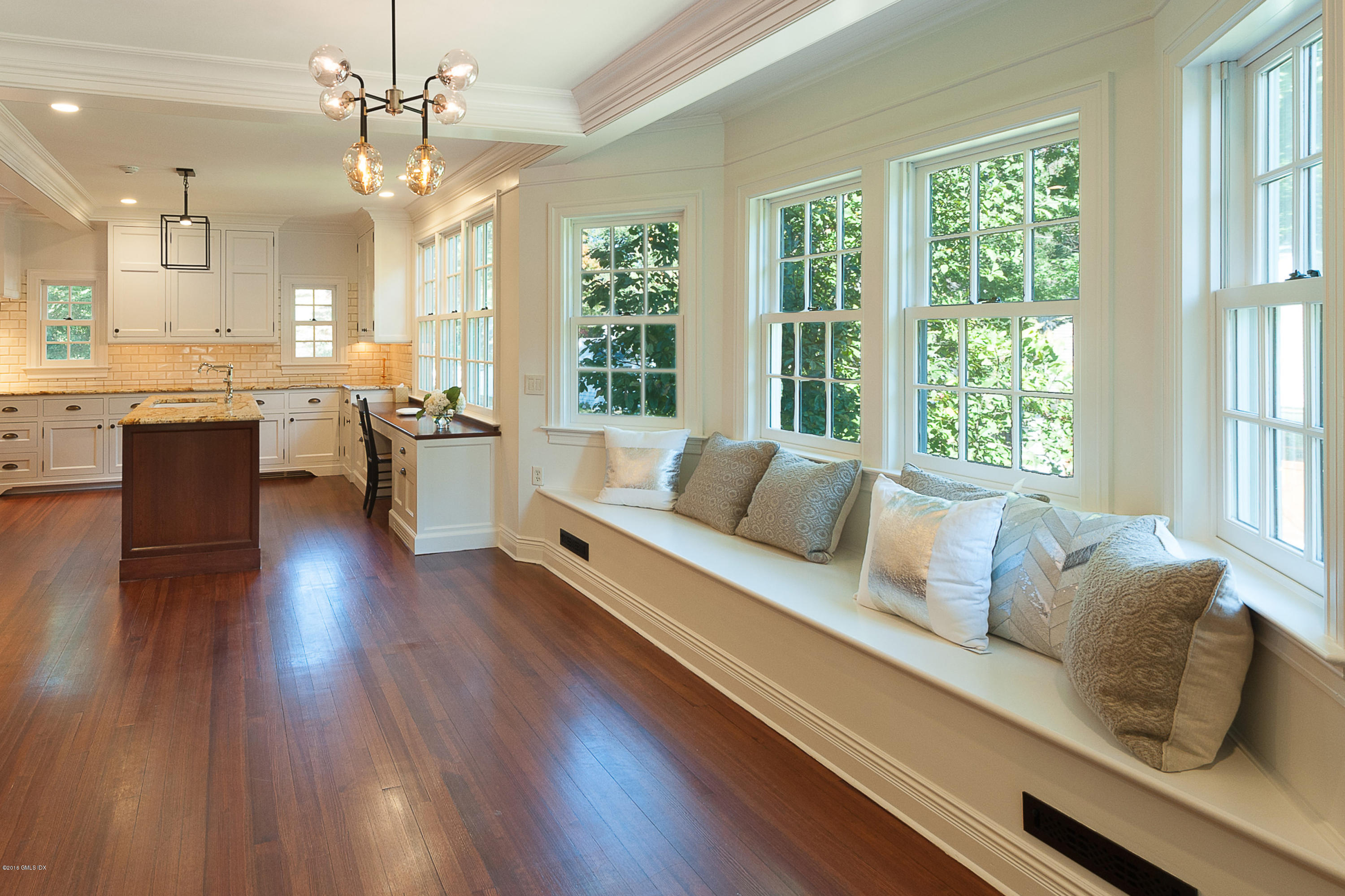 19 Indian Head Road Riverside, CT 06878 - Photo 14 of 34 a living room with furniture and a large window