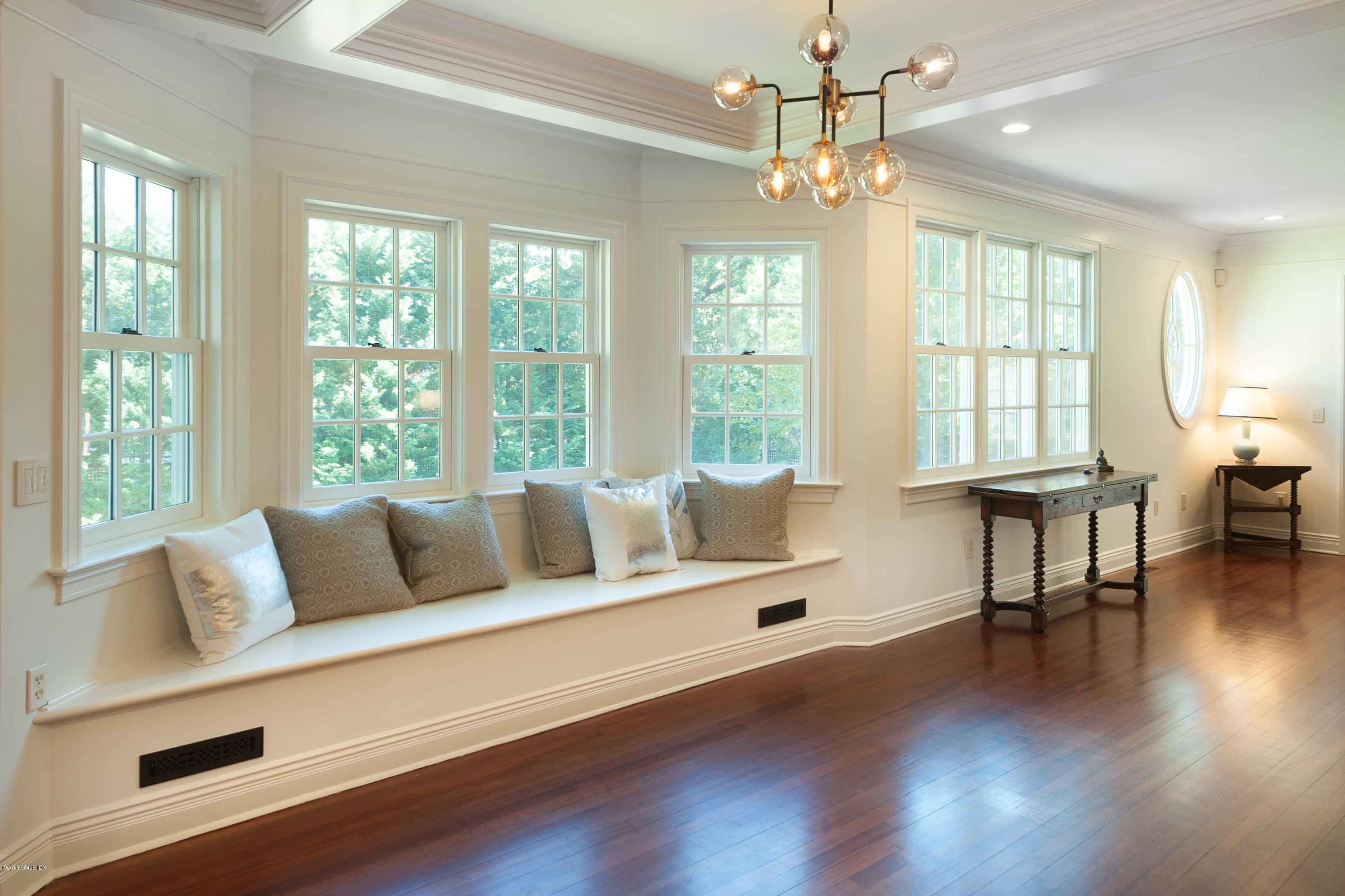 19 Indian Head Road Riverside, CT 06878 - Photo 15 of 34 a living room with furniture and a large window