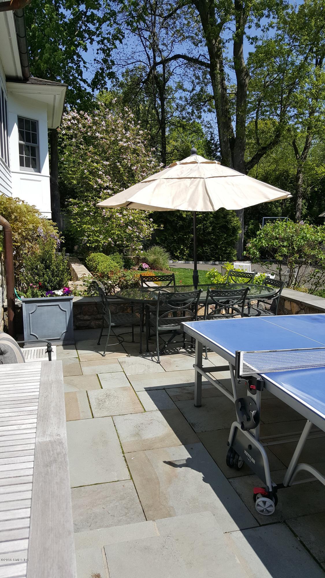 19 Indian Head Road Riverside, CT 06878 - Photo 19 of 34 a view of backyard with outdoor seating and trees