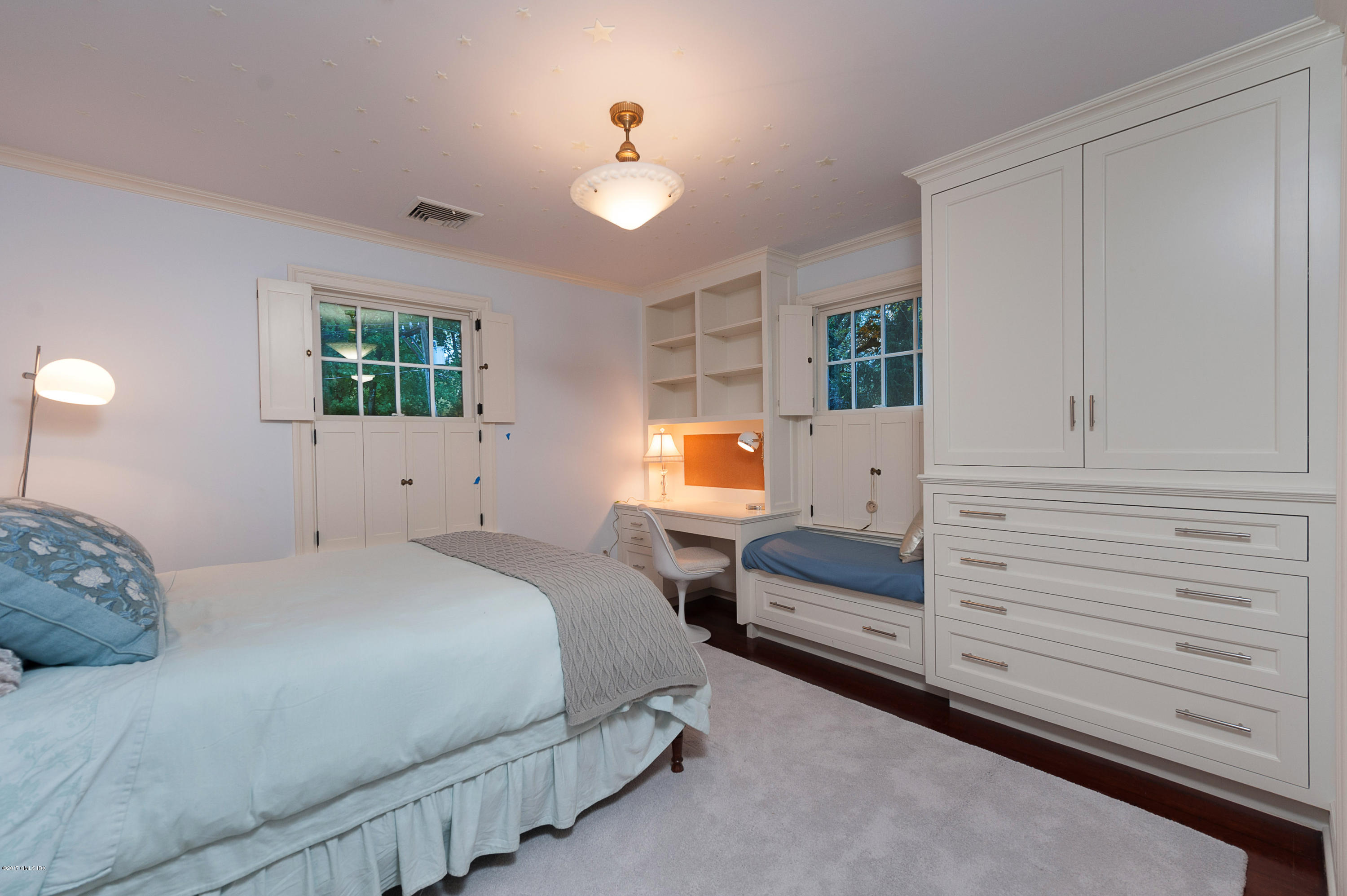 19 Indian Head Road Riverside, CT 06878 - Photo 28 of 34 a bedroom with a bed and a window