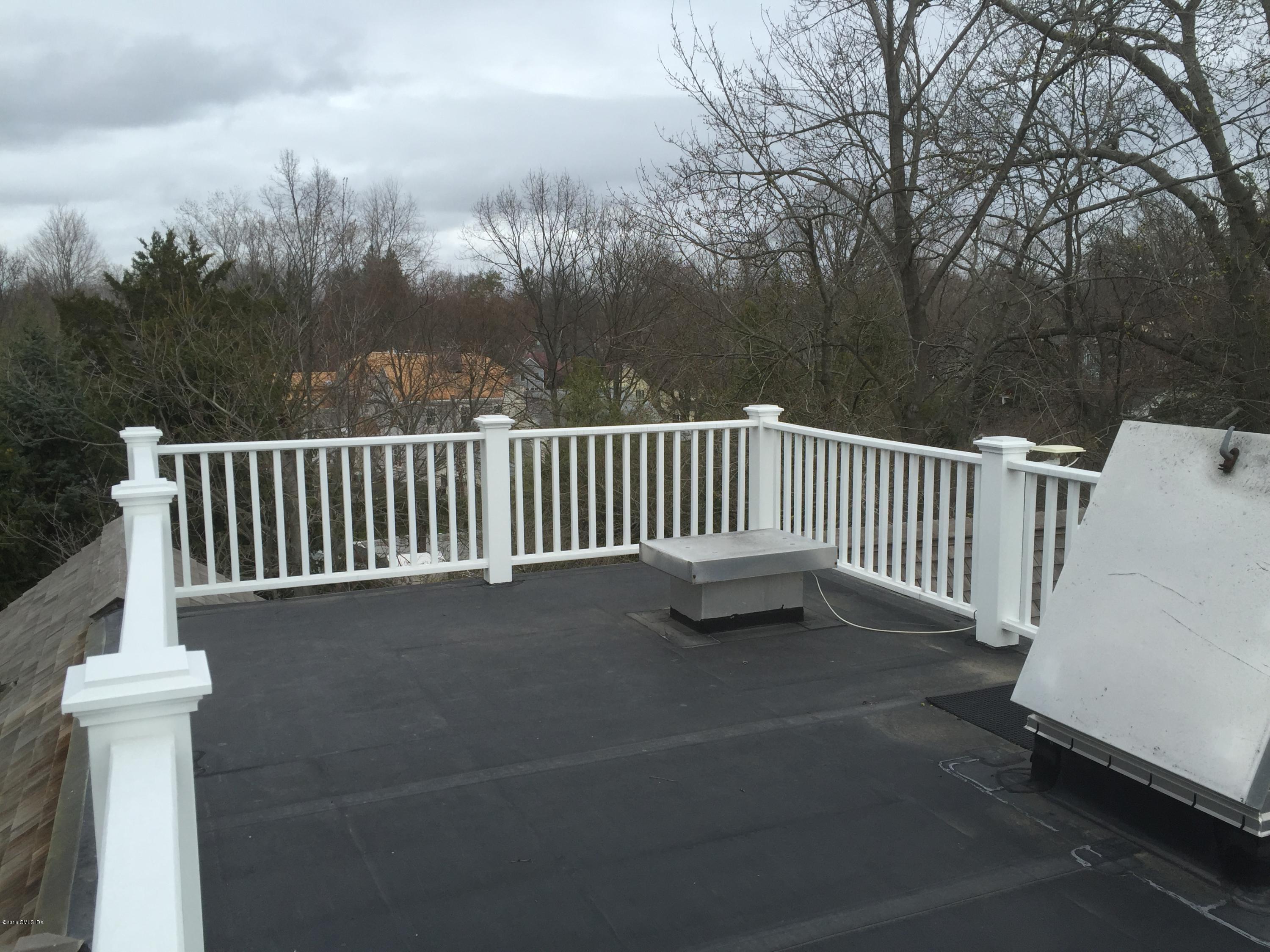 19 Indian Head Road Riverside, CT 06878 - Photo 32 of 34 a view of balcony with furniture