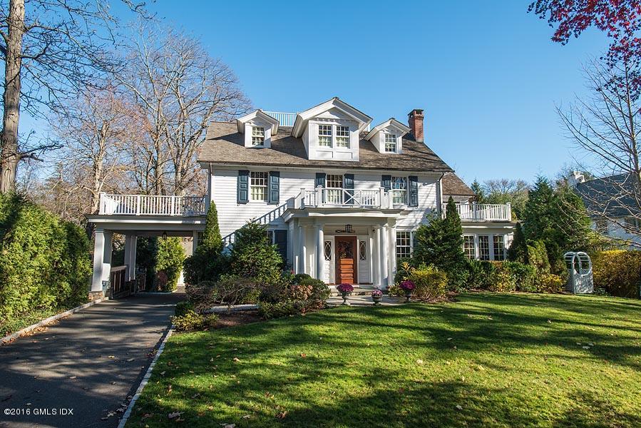 19 Indian Head Road Riverside, CT 06878 - Photo 33 of 34 a front view of a house with a garden
