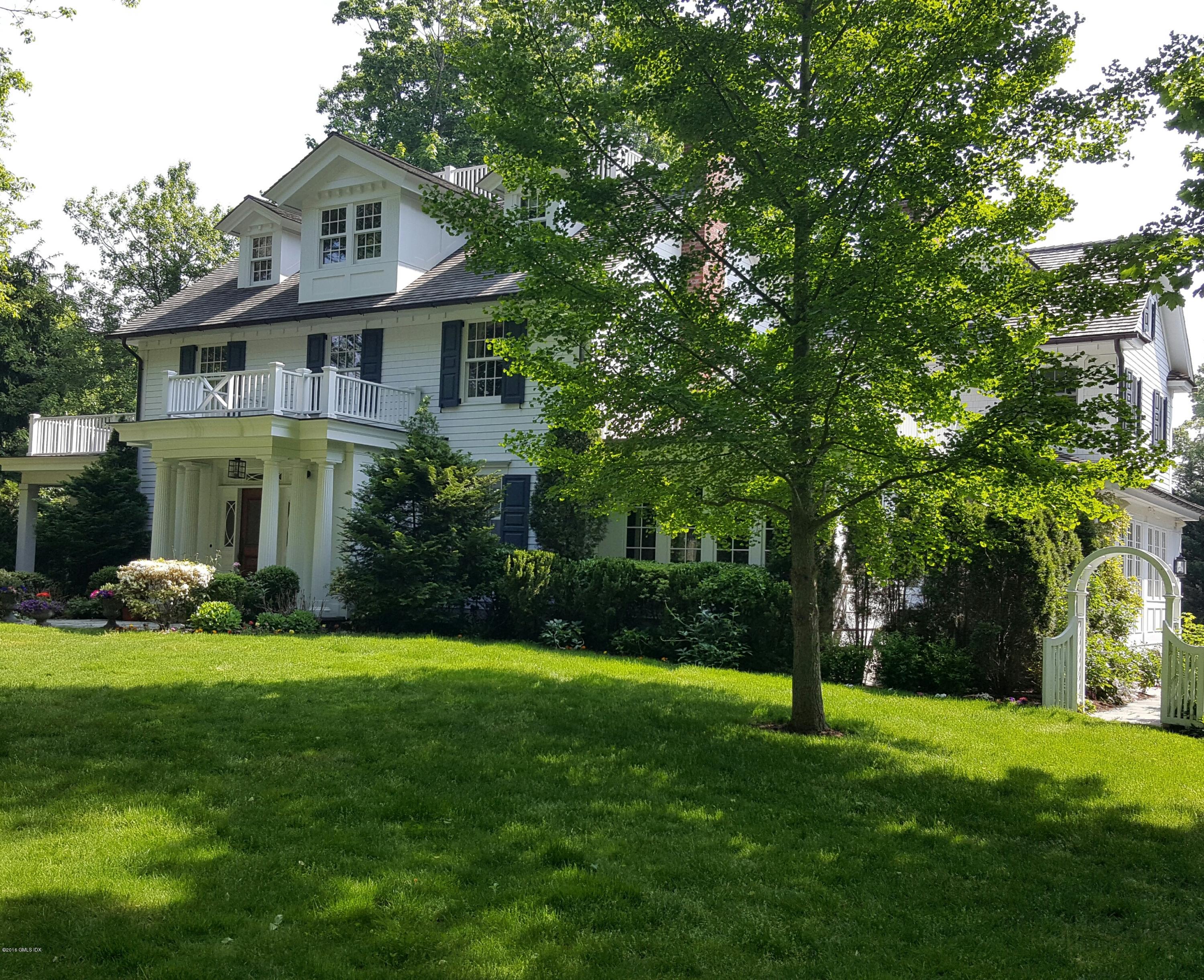 19 Indian Head Road Riverside, CT 06878 - Photo 34 of 34 a front view of a house with a yard