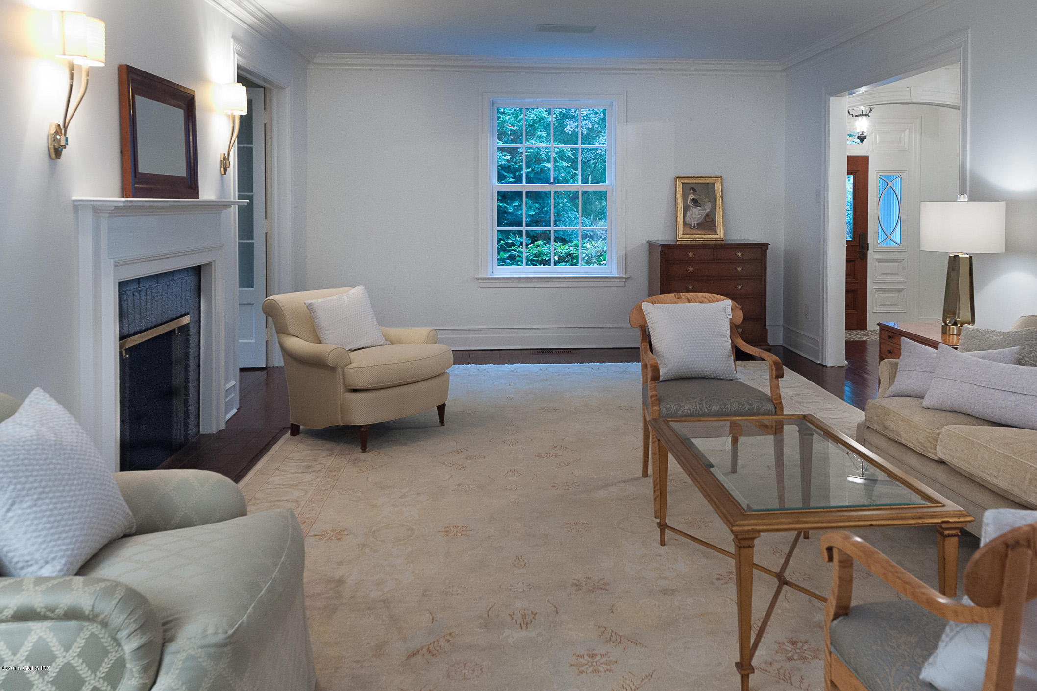 19 Indian Head Road Riverside, CT 06878 - Photo 7 of 34 a living room with furniture and a window