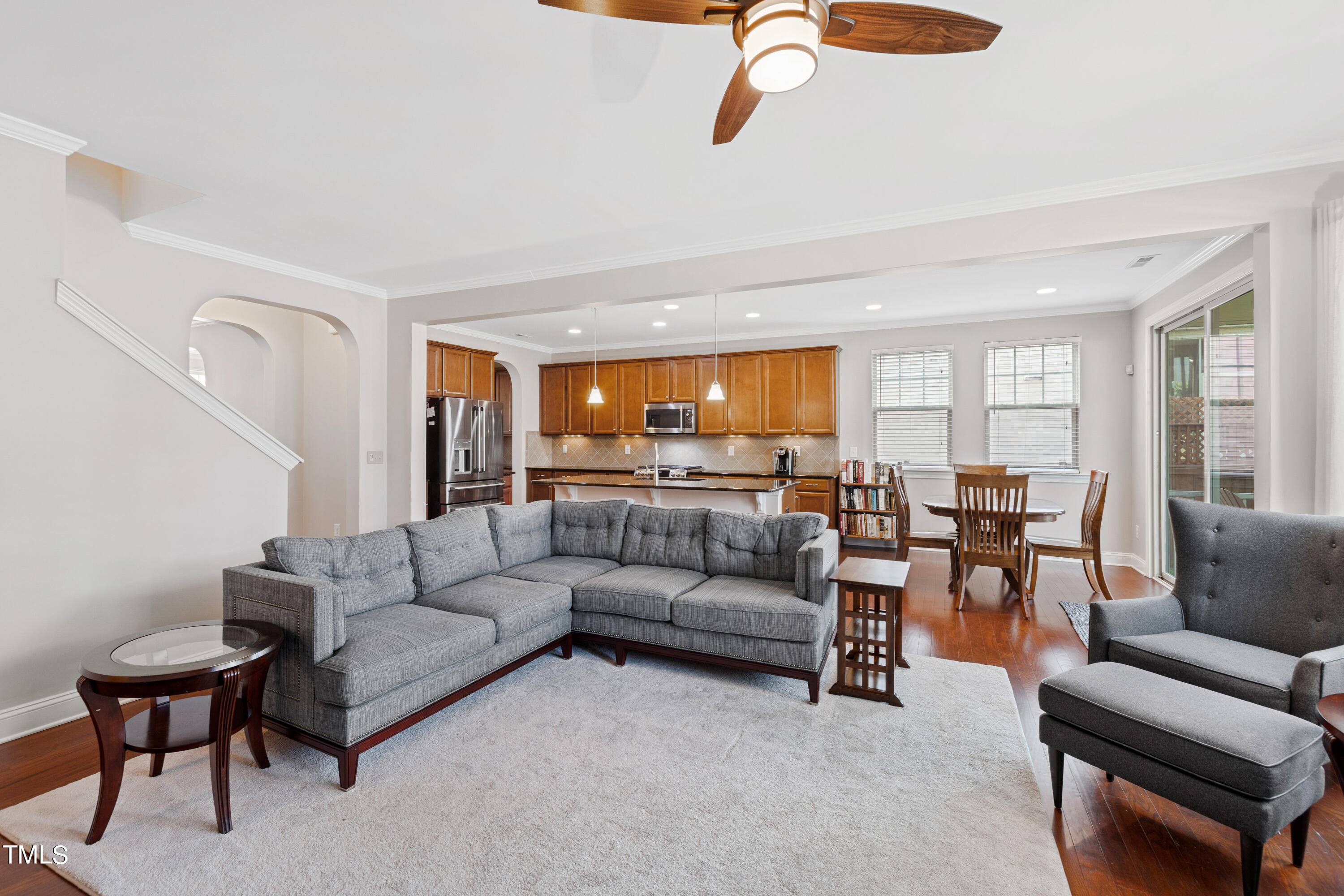 6004 Clapton Drive Wake Forest, NC 27587 - Photo 20 of 52 a living room with furniture and a large window